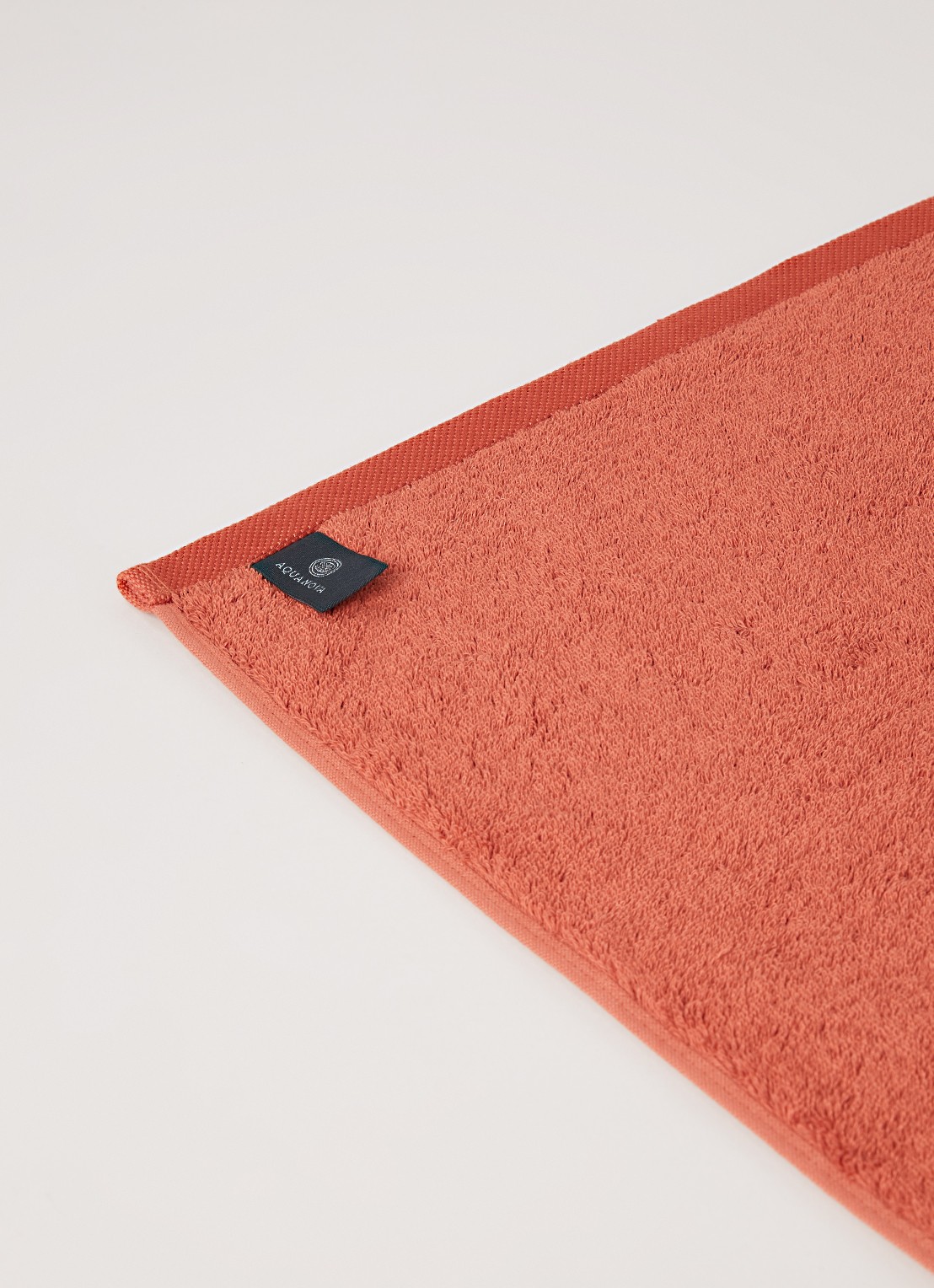 Aquanova London gastendoek 30 cm x 50 cm - detail oranjerood