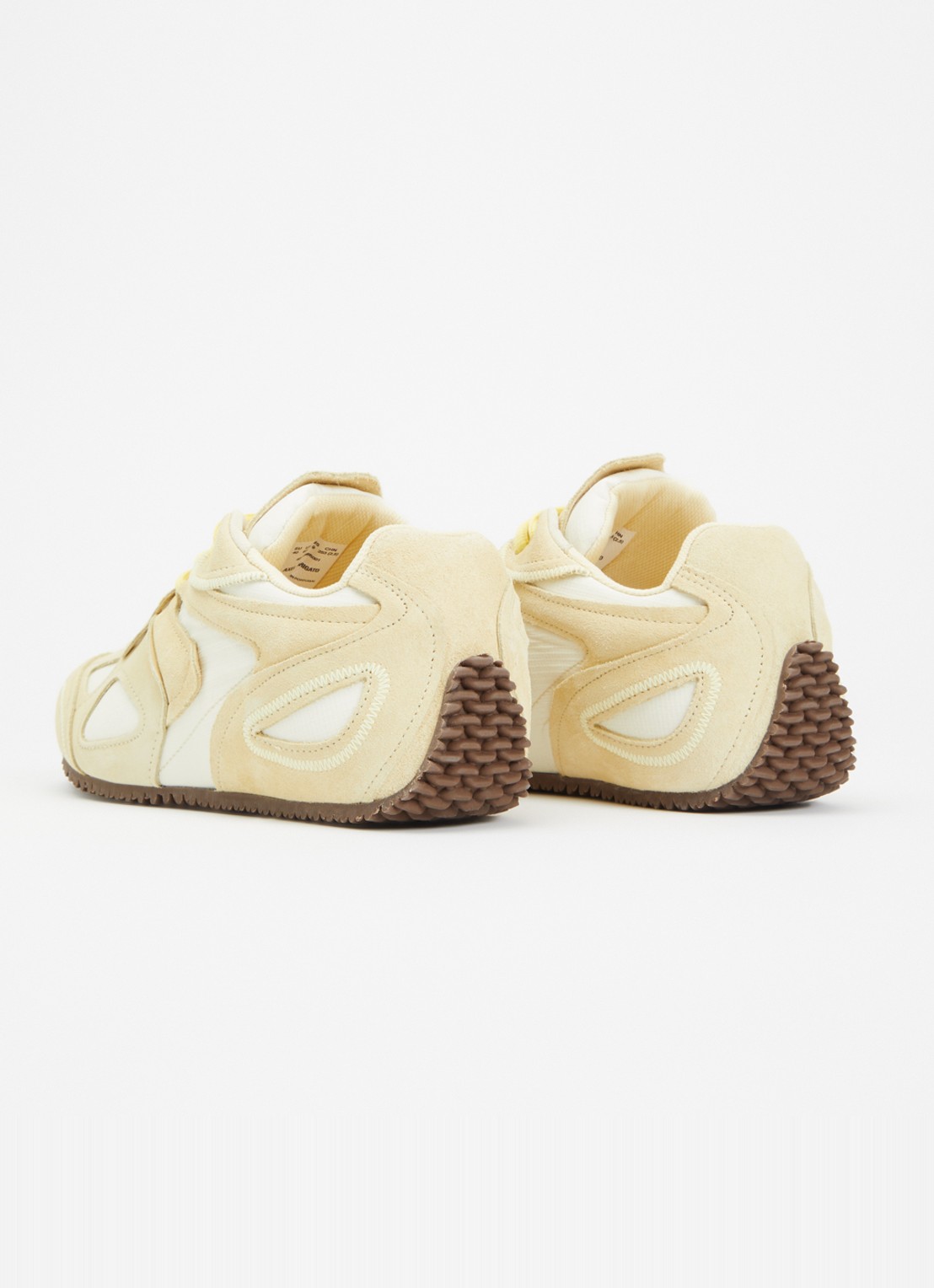 Axel Arigato Slow Runner sneaker met suède details - achterkant 4 lichtgeel