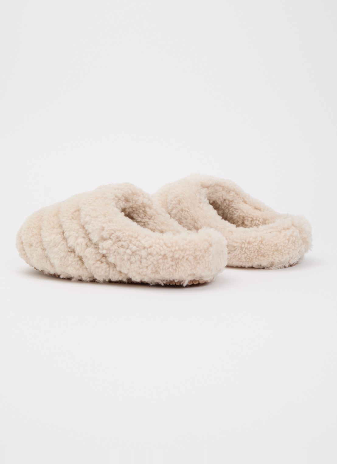 Axel Arigato Snail Shearling muiltje van teddy - achterkant lichtbruin