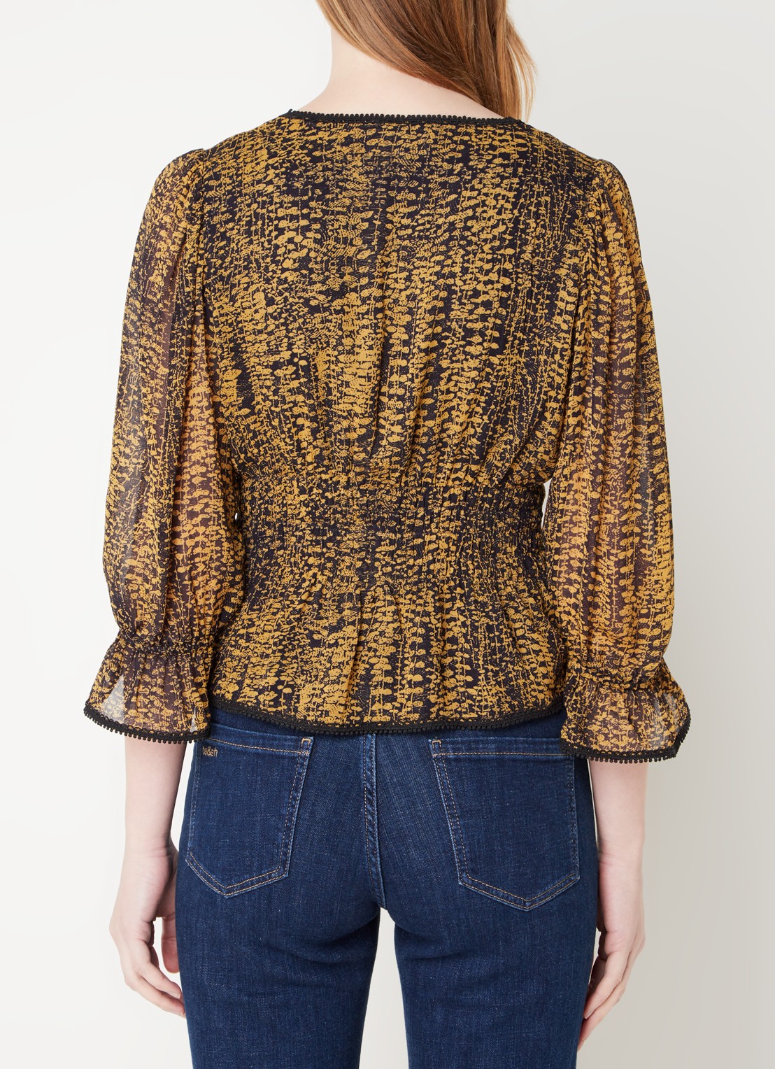 ba&sh Chili semi-transparante top met print en smockwerk - achterkant okergeel