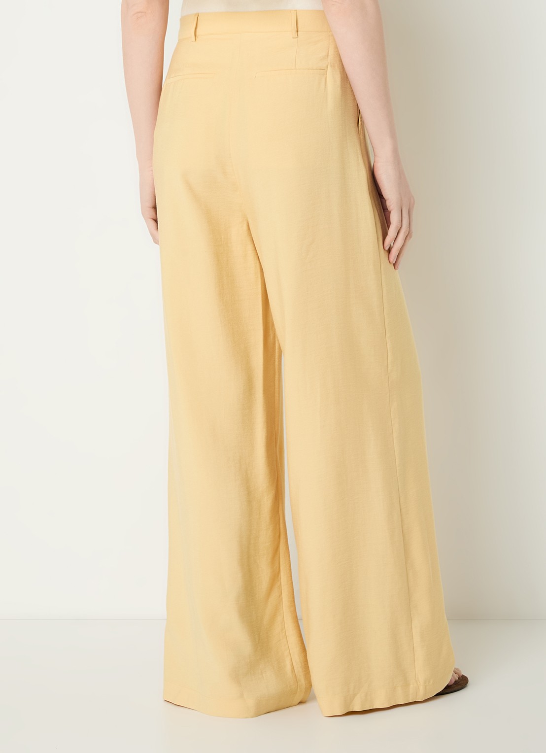 ba&sh Deana high waist wide leg pantalon met steekzakken - achterkant geel