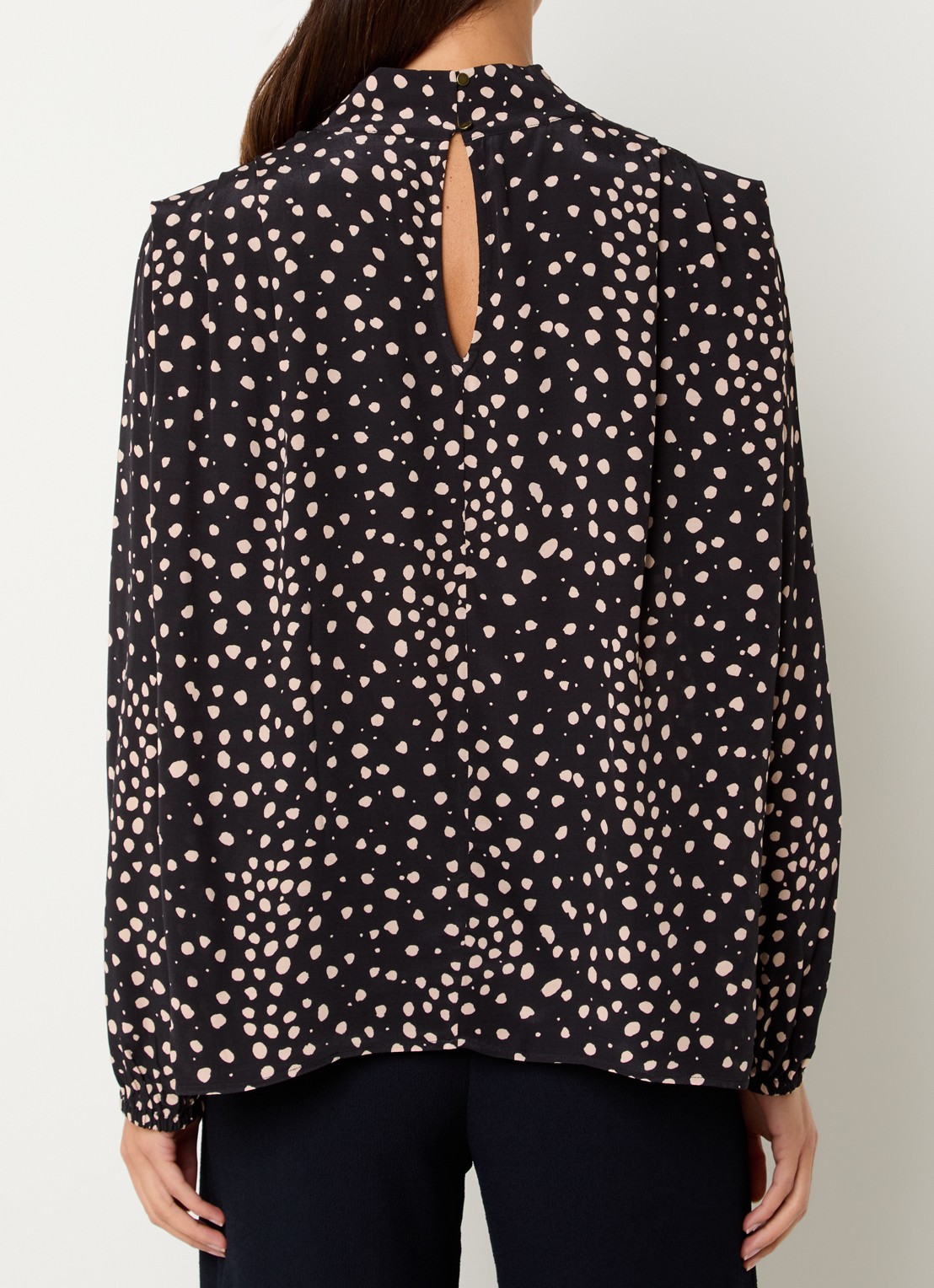 ba&sh Delphine top met stippenprint en asymmetrisch detail - achterkant zwart