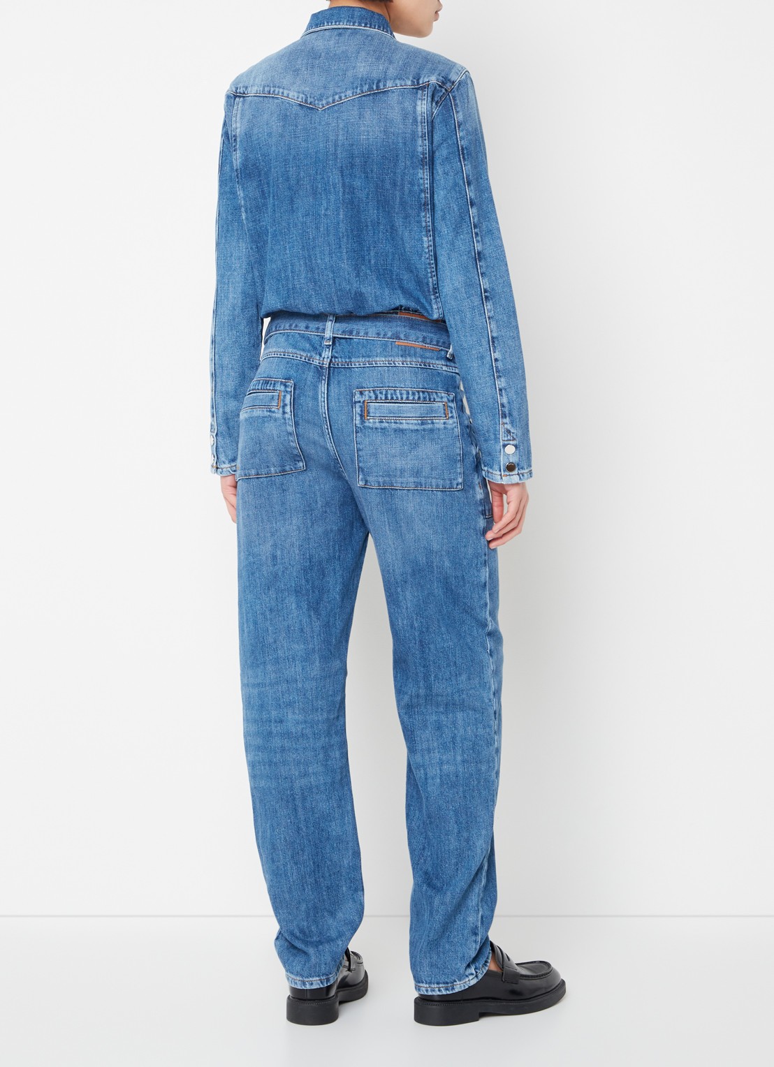 ba&sh Jerry tapered fit jumpsuit van denim met strikceintuur - achterkant indigo
