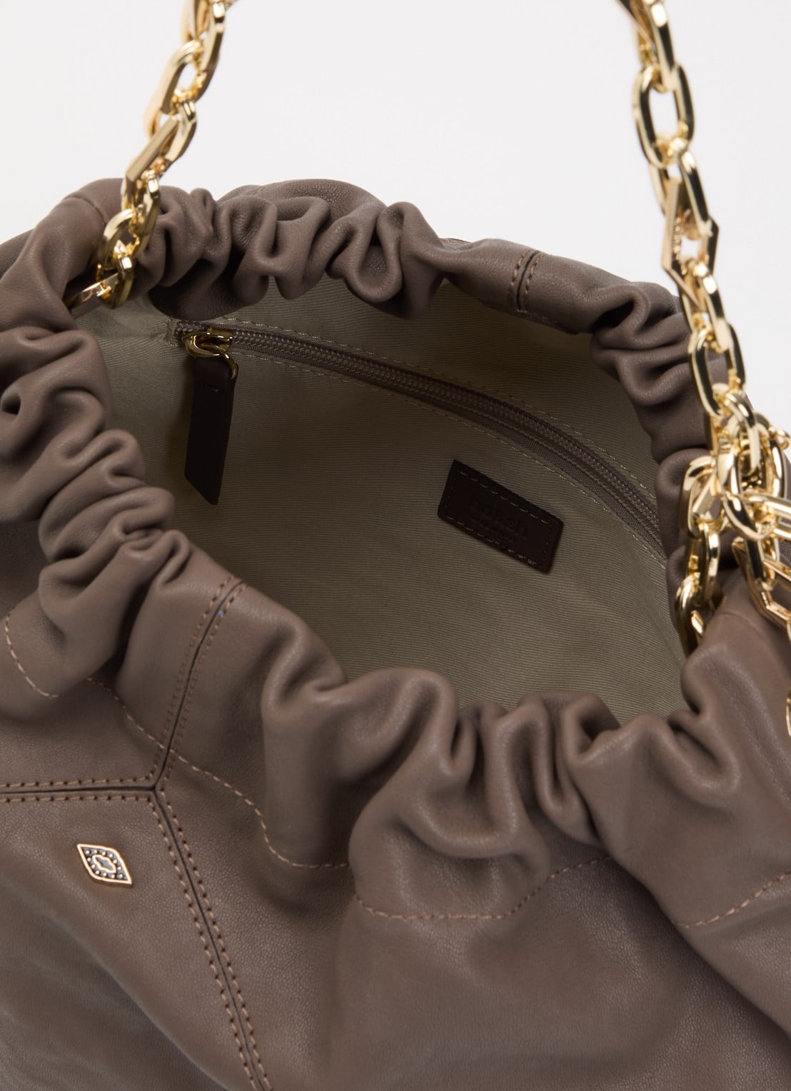 ba&sh June schoudertas van lamsleer - detail 2 taupe