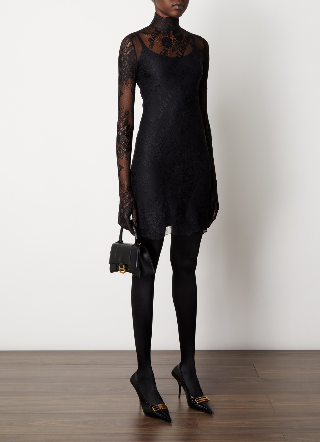 Balenciaga Mini jurk van kant met logoprint - voorkant 4 zwart