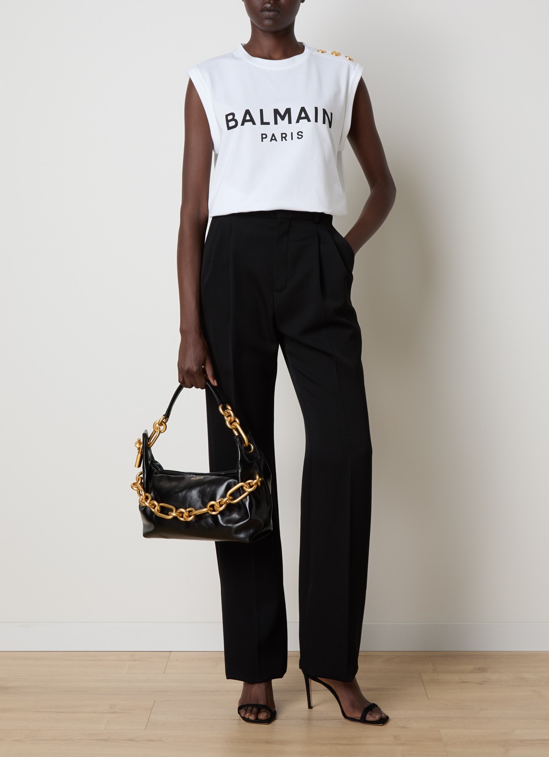Balmain Mouwloze top met sierknopen en logoprint - voorkant 3 wit