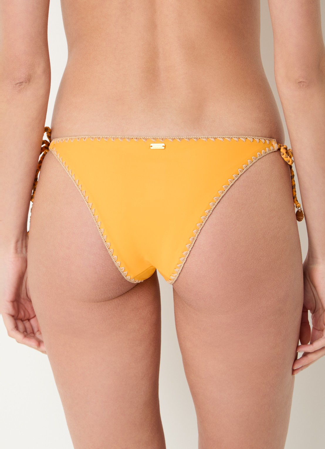 Banana Moon Blika Nazca tanga bikinislip met lurex - achterkant oranje