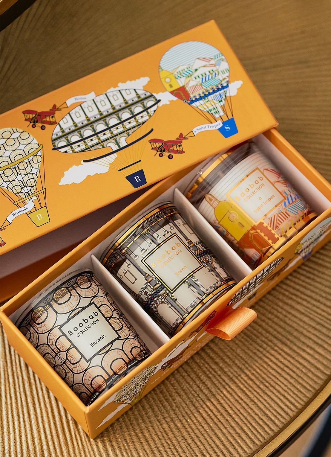 Baobab Collection Trio Travel geurkaarsen set van 3 - voorkant 2 oranje