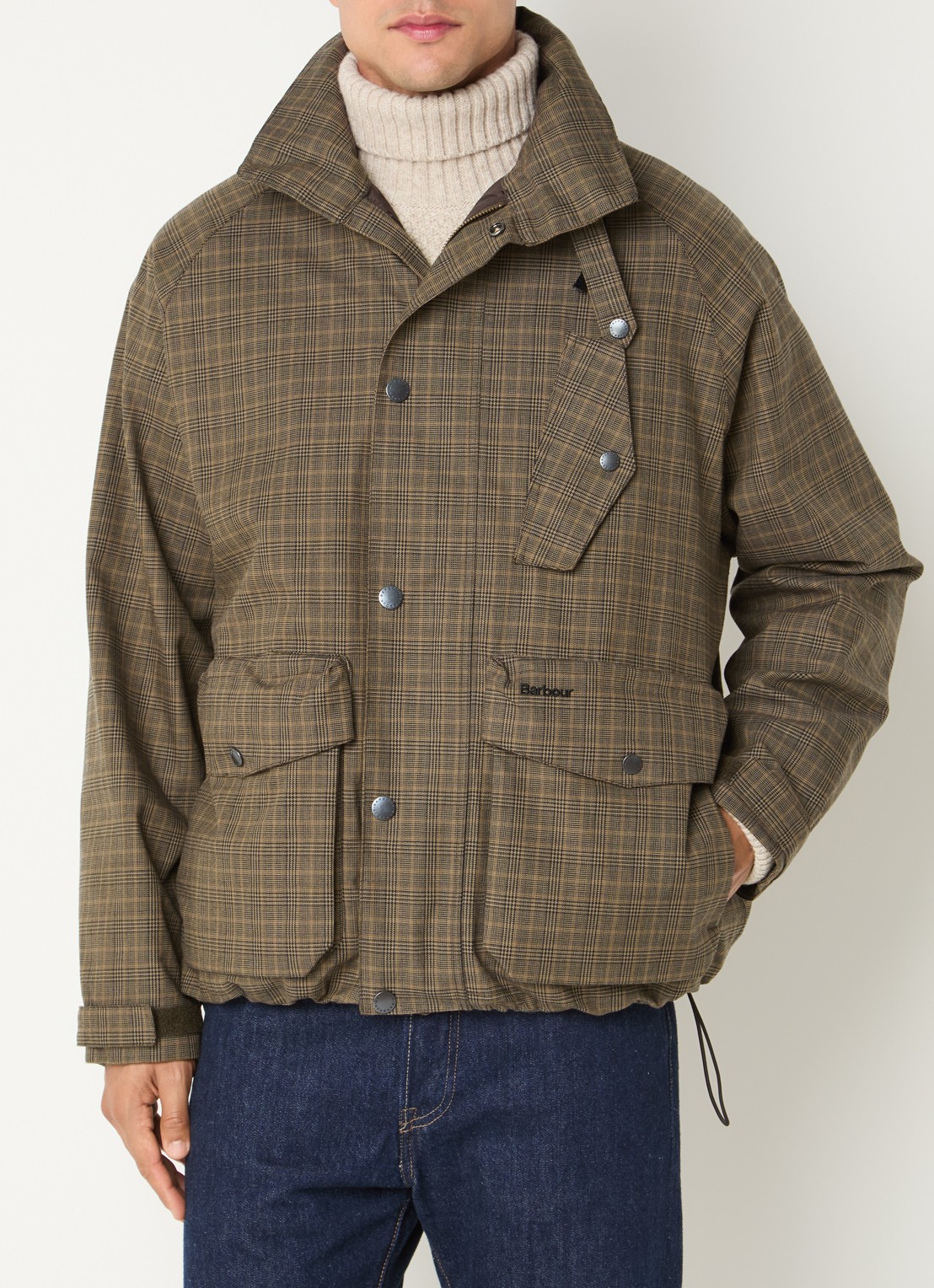 Barbour Transport regenjack met ruitdessin en opbergbare capuchon - detail beige