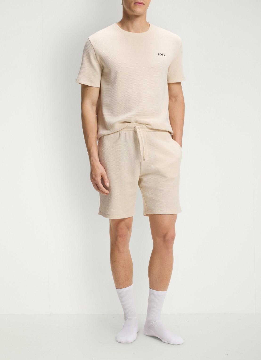 BOSS Loose fit korte broek met logo - voorkant 3 beige