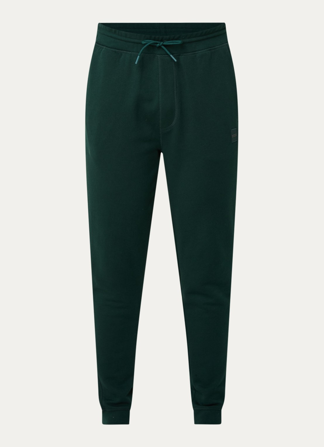 BOSS Tapered fit joggingbroek met logo en steekzakken - voorkant 2 bronsgroen