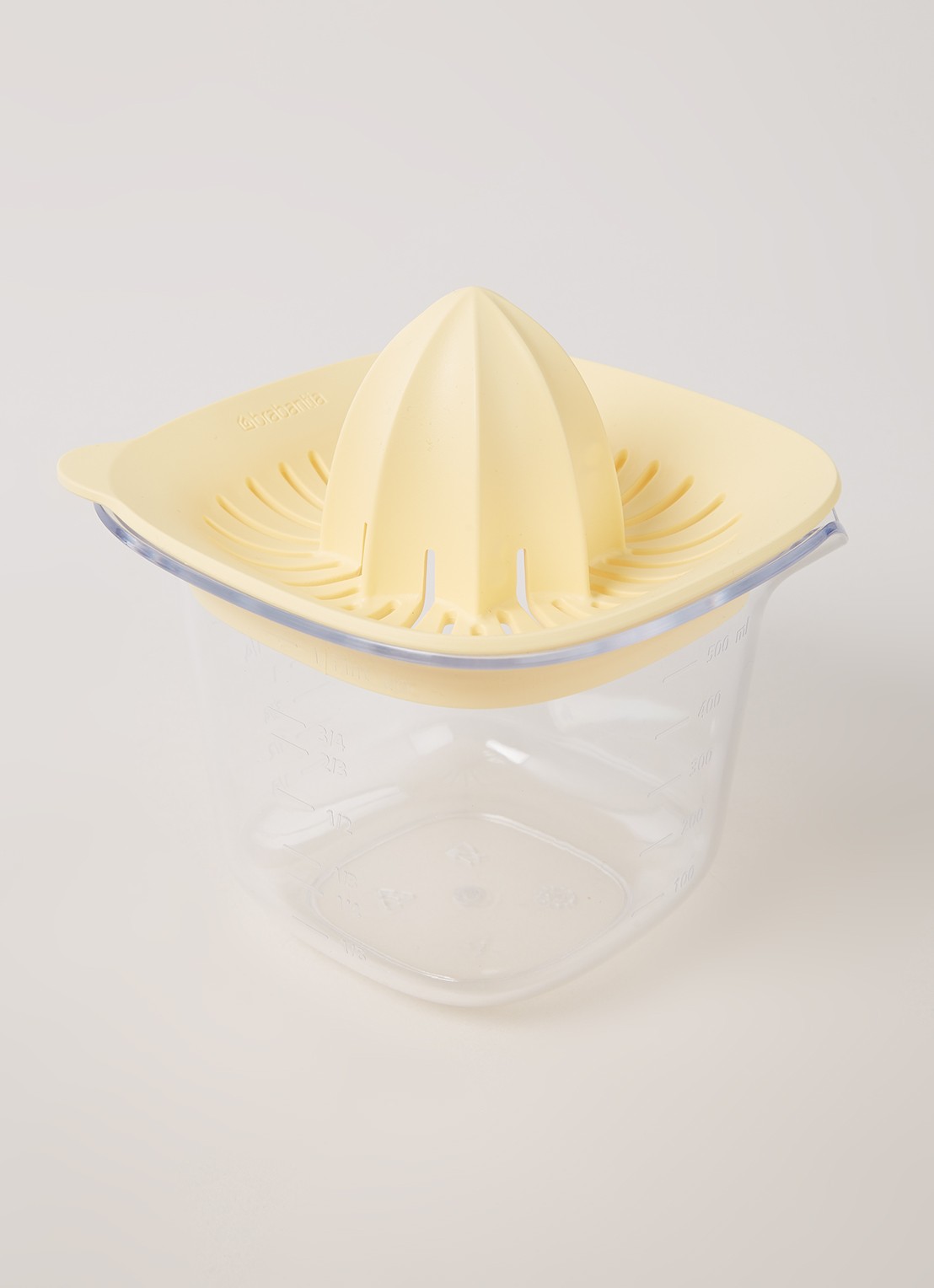 Brabantia TASTY+ citruspers met maatbeker 0,5 liter - voorkant 2 lichtgeel