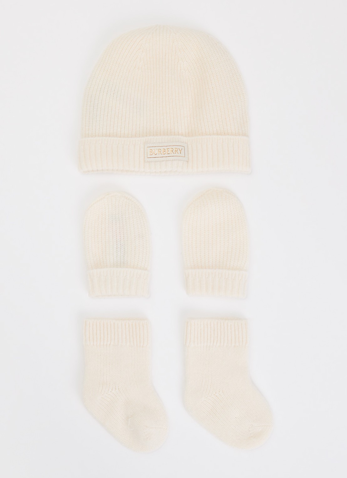 Burberry N7 set van muts met handschoenen en sokken van kasjmier - voorkant ivoor