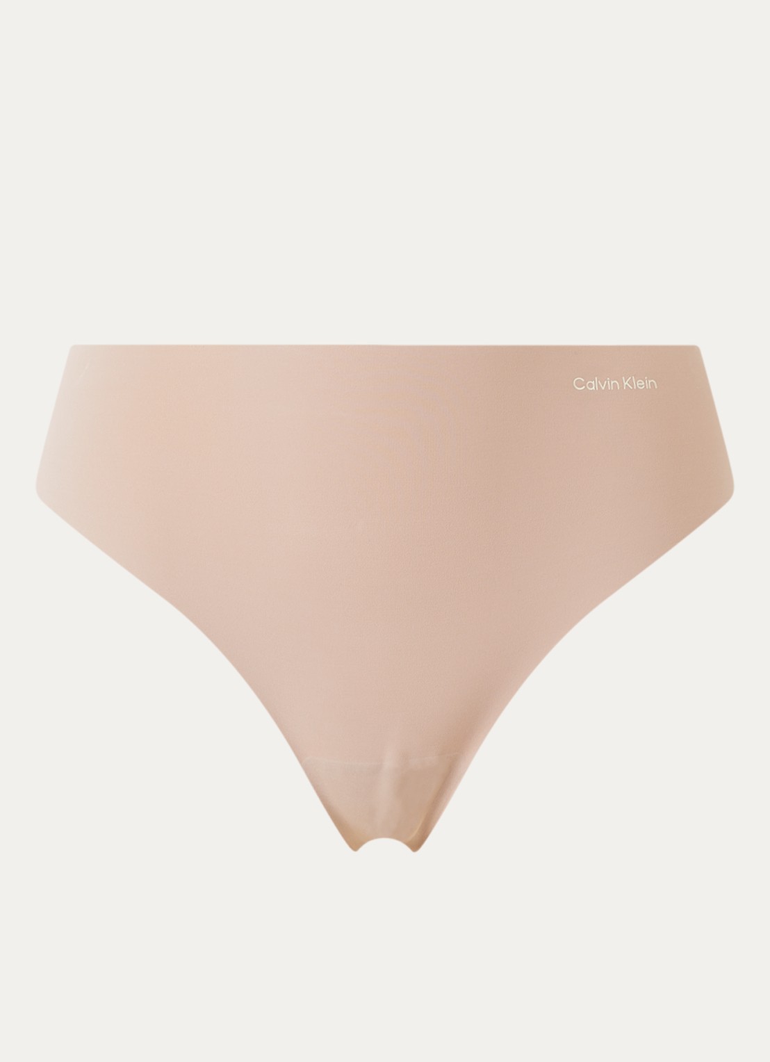 Calvin Klein Invisibles naadloze tanga met logo - voorkant beige