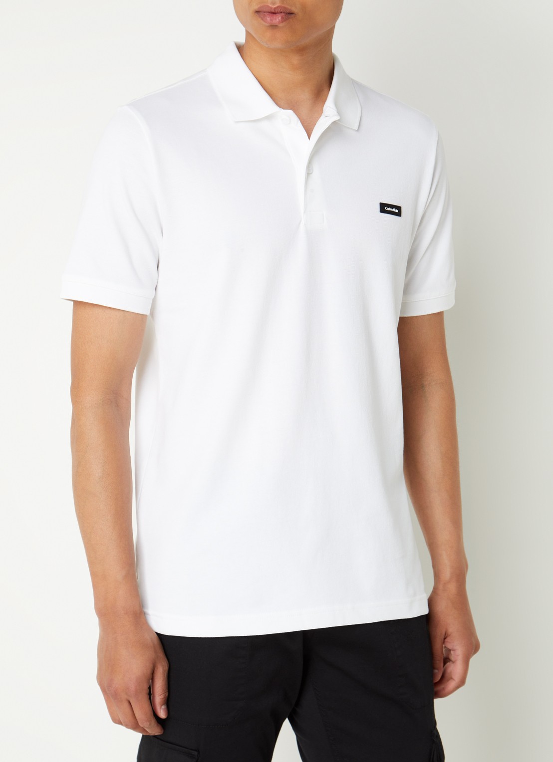 Calvin Klein Slim fit polo van piqué katoen met logo - detail wit