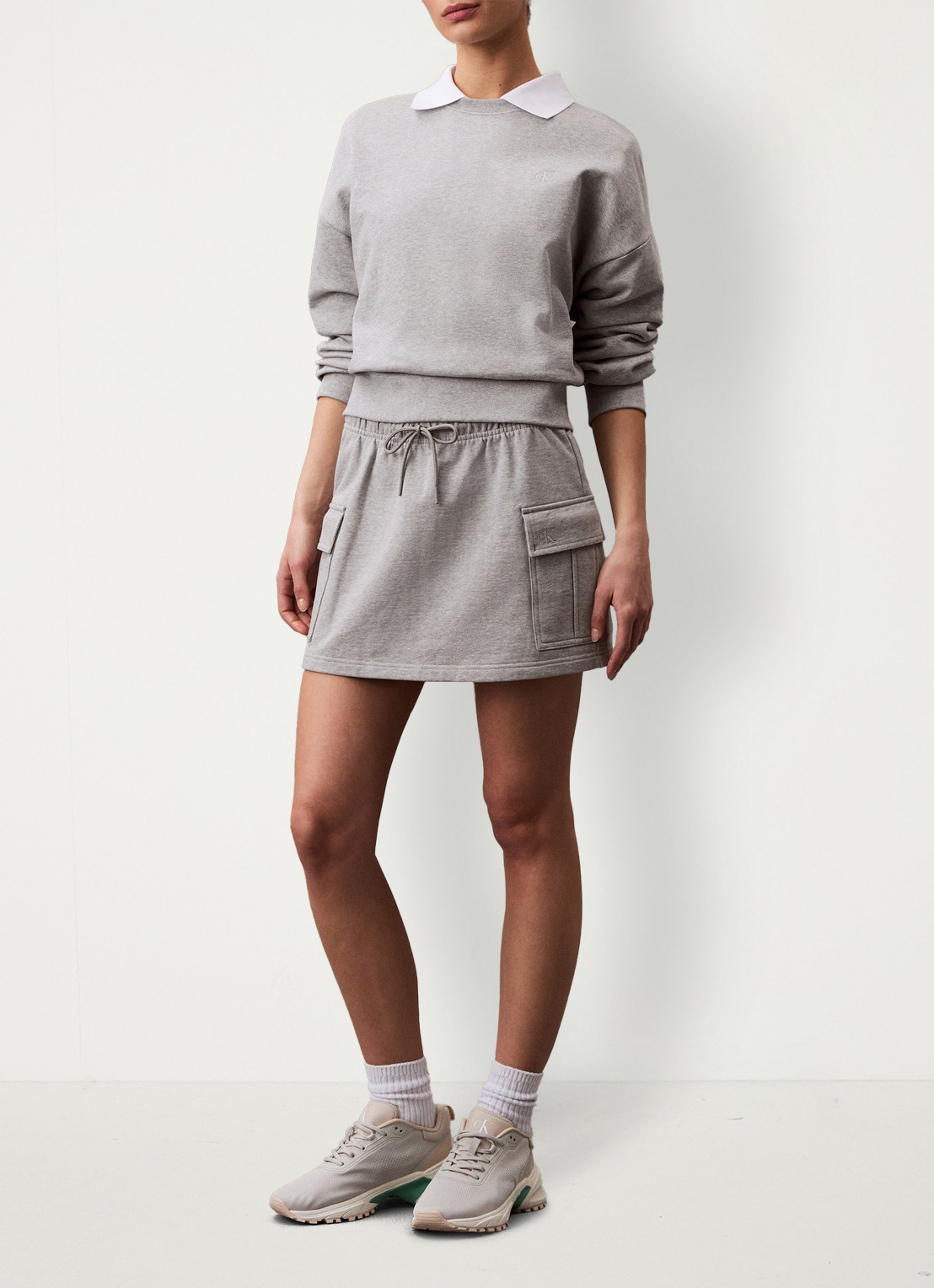 Calvin Klein Terry Cargo minirok met klepzakken - voorkant 2 grijsmele