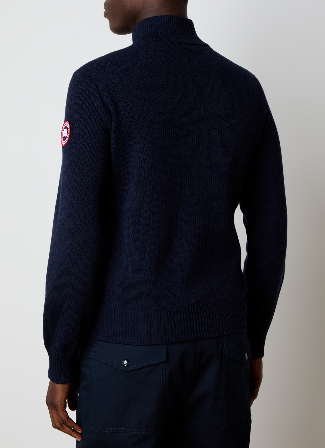 Canada Goose Hybridge ribgebreid vest van wol met gewatteerd voorpand - achterkant donkerblauw