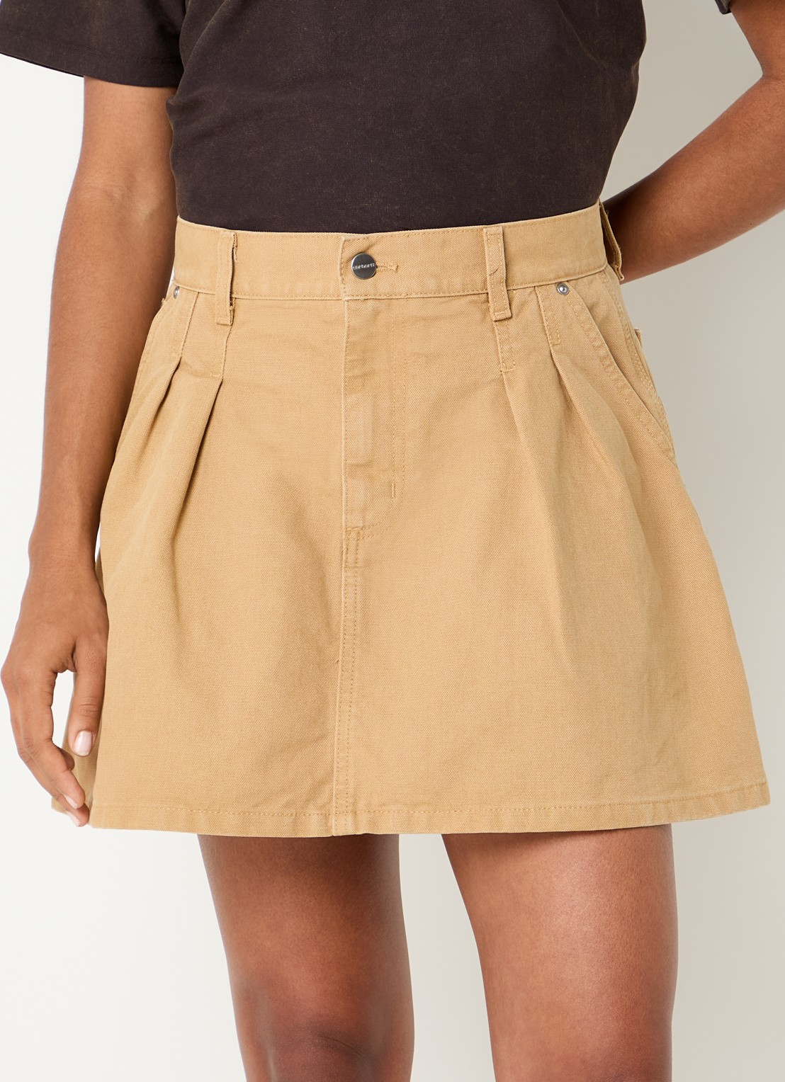 Carhartt WIP Billie mini rok van denim met steekzakken - detail okergeel