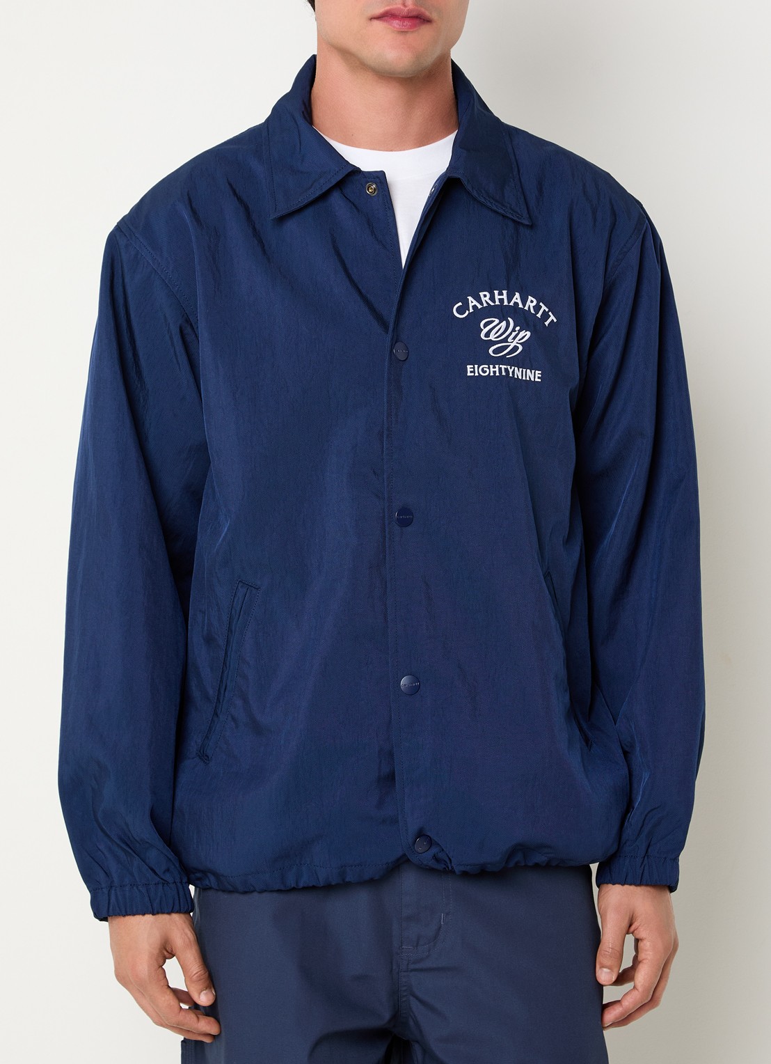 Carhartt WIP Eightynine Coach softshell jack met steekzakken - detail 2 indigo