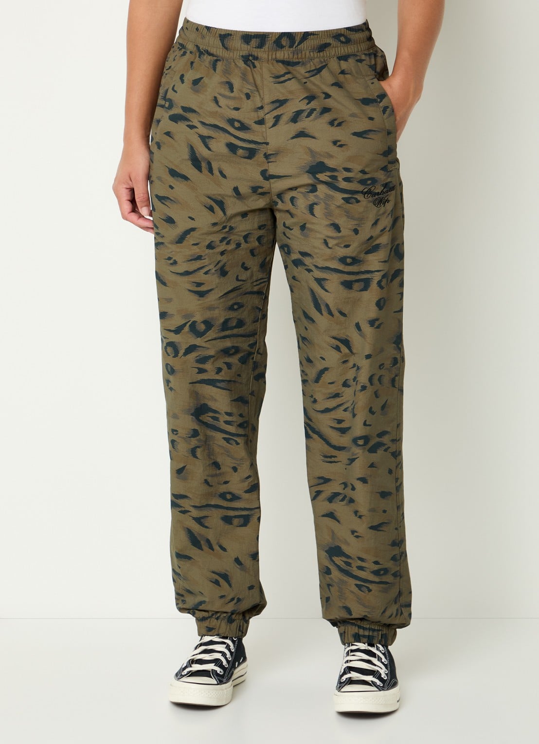 Carhartt WIP High waist tapered fit trackpants met steekzakken - detail 3 bronsgroen