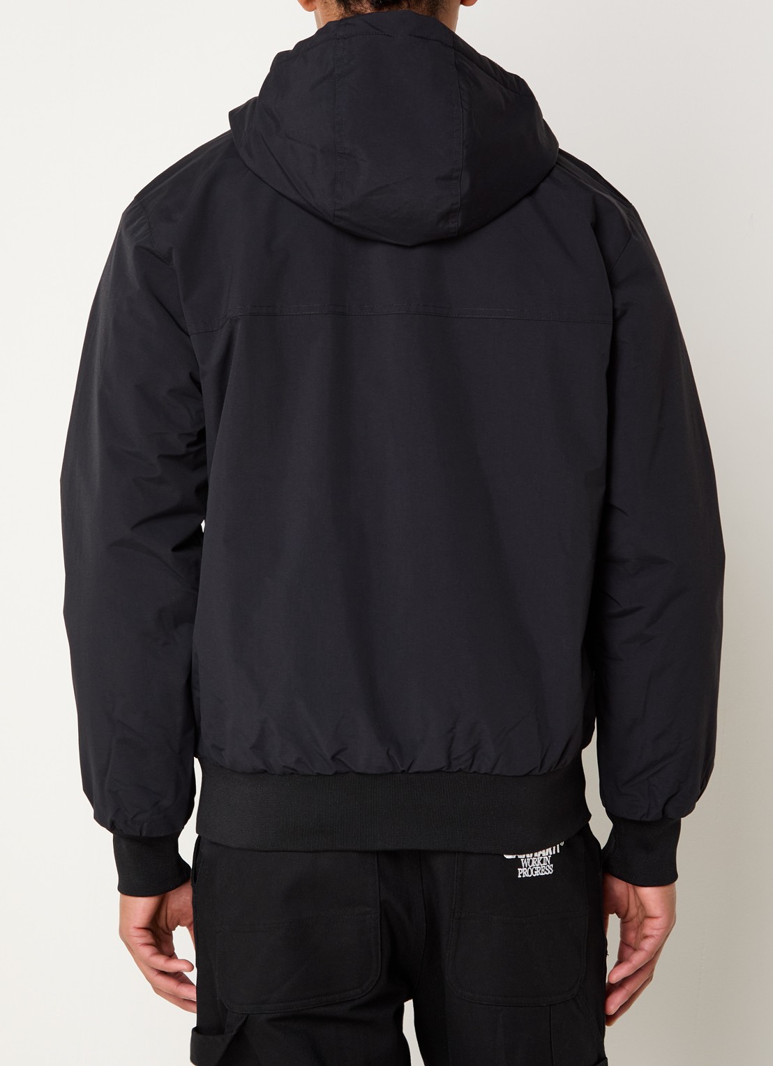 Carhartt WIP Sail windjack met capuchon en fleece voering - achterkant zwart