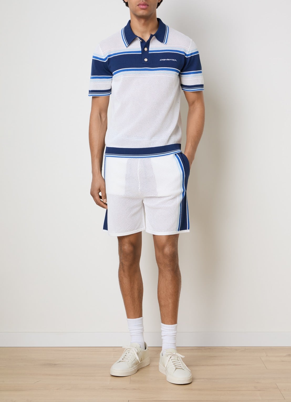 Casablanca Regular fit polo met opengewerkt dessin en logo - voorkant 2 donkerblauw