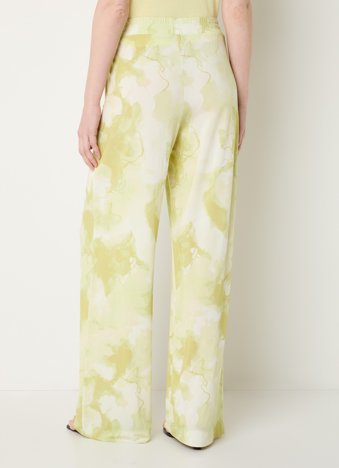 Claudia Sträter Mid waist loose fit broek van jersey met tie-dye dessin - achterkant neongroen