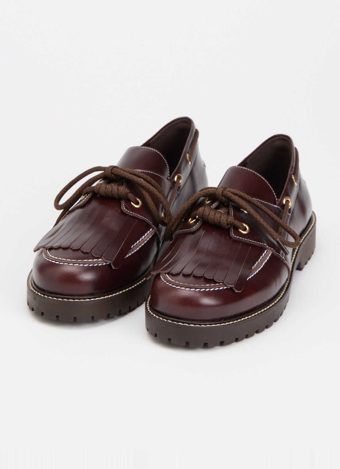 Claudie Pierlot Audrey bootschoen van leer met franjes - detail chocoladebruin