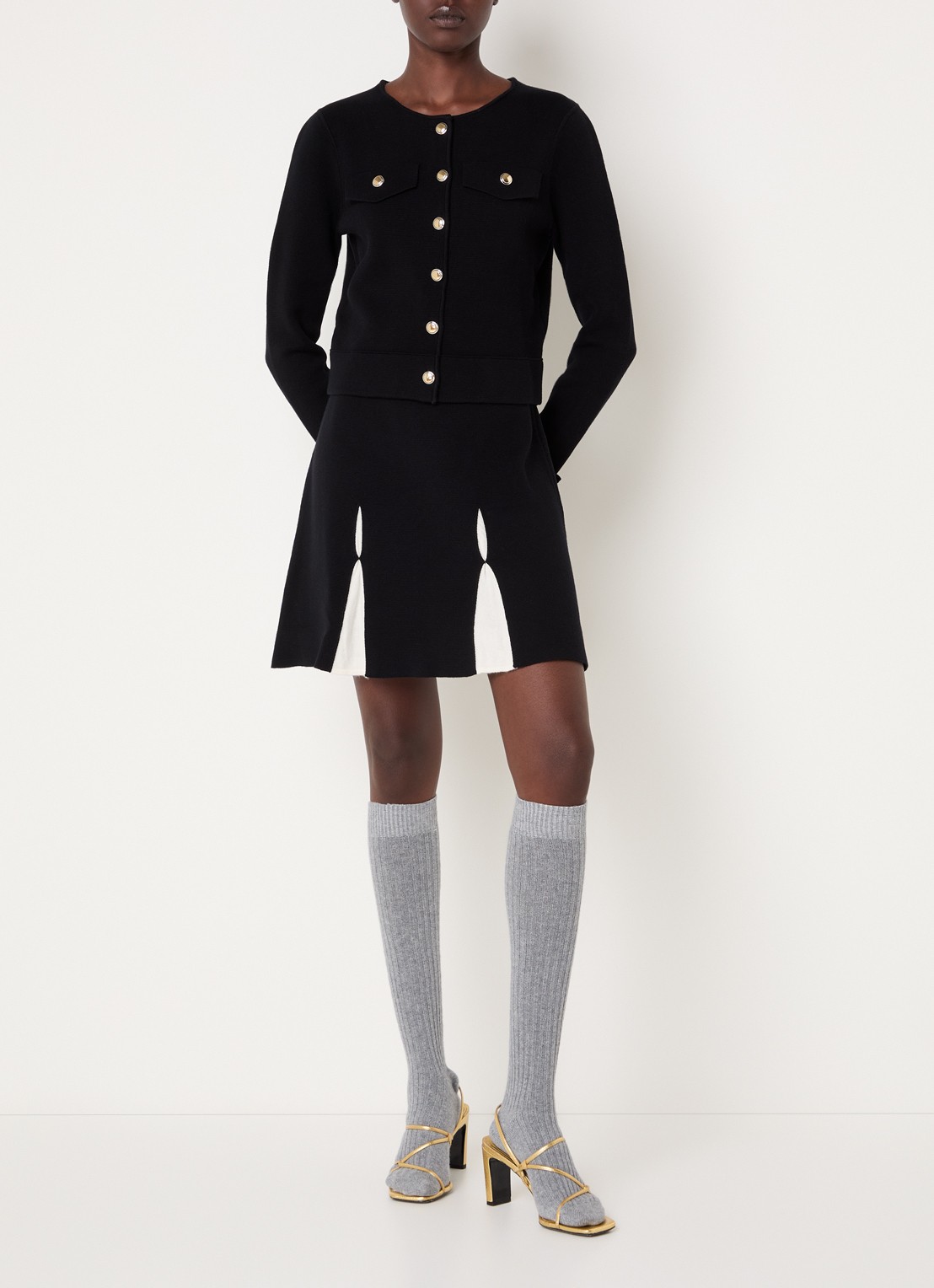 Claudie Pierlot Fijngebreide high waist mini plooirok in wolblend - voorkant 2 zwart