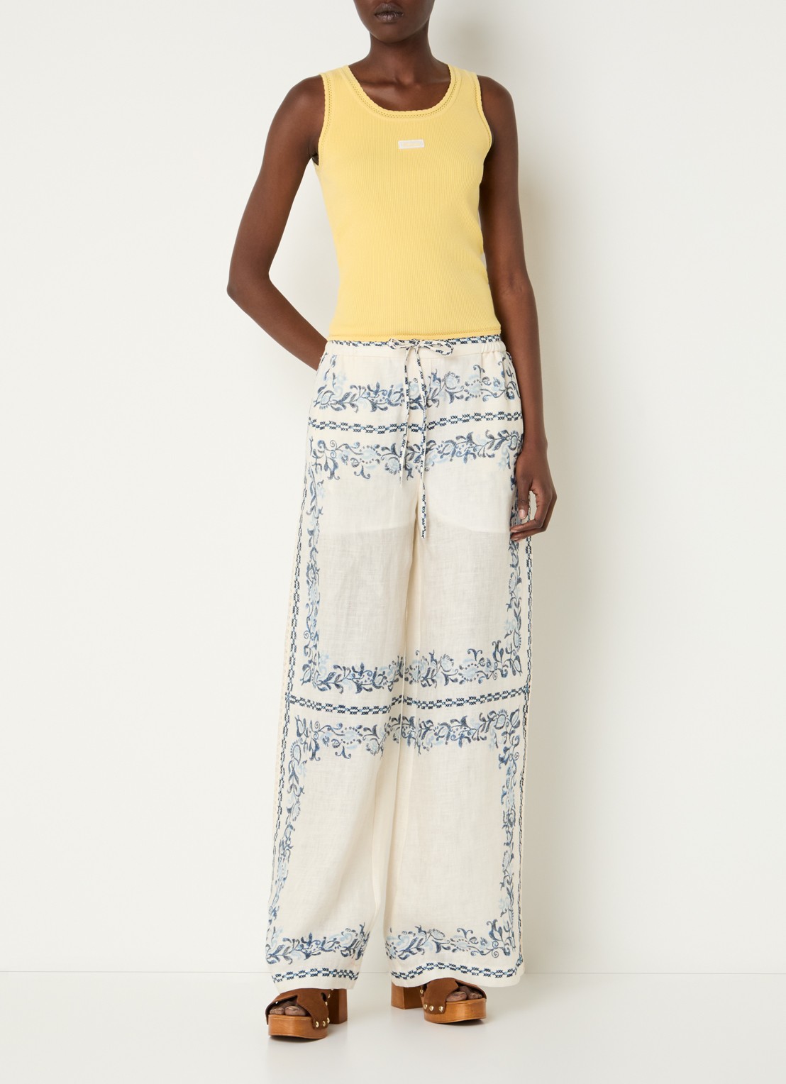 Claudie Pierlot Mid waist wide fit palazzo broek met steekzakken en details van kant - voorkant 2 creme