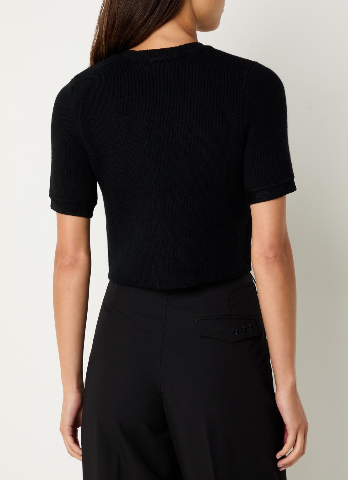 Claudie Pierlot Ribgebreide crop top in wolblend - achterkant zwart