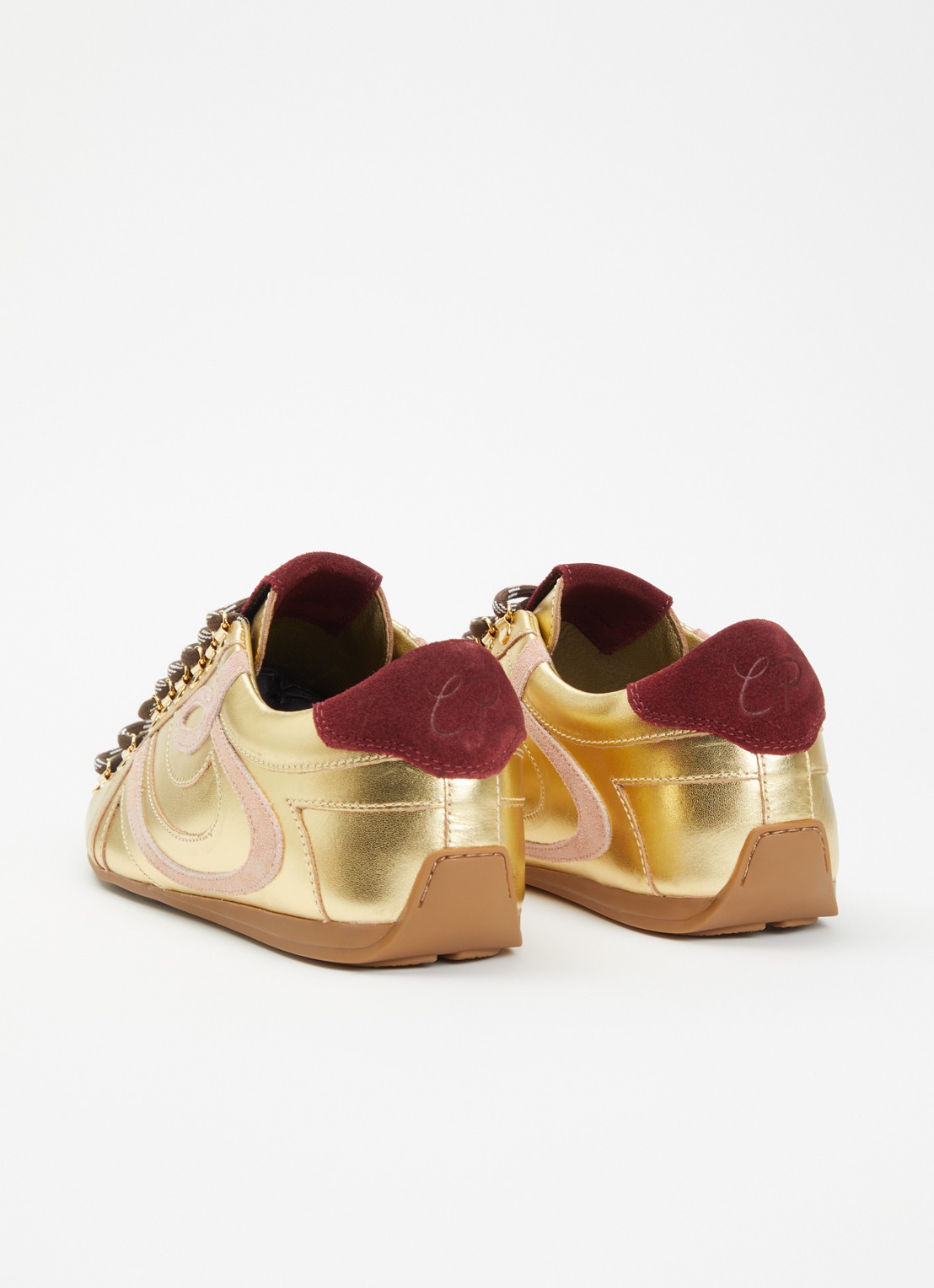 Claudie Pierlot Swing sneaker van leer met metallic finish - achterkant goud