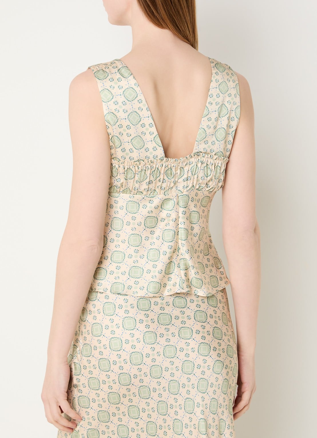 Claudie Pierlot Top met V-hals en print - achterkant lichtgroen