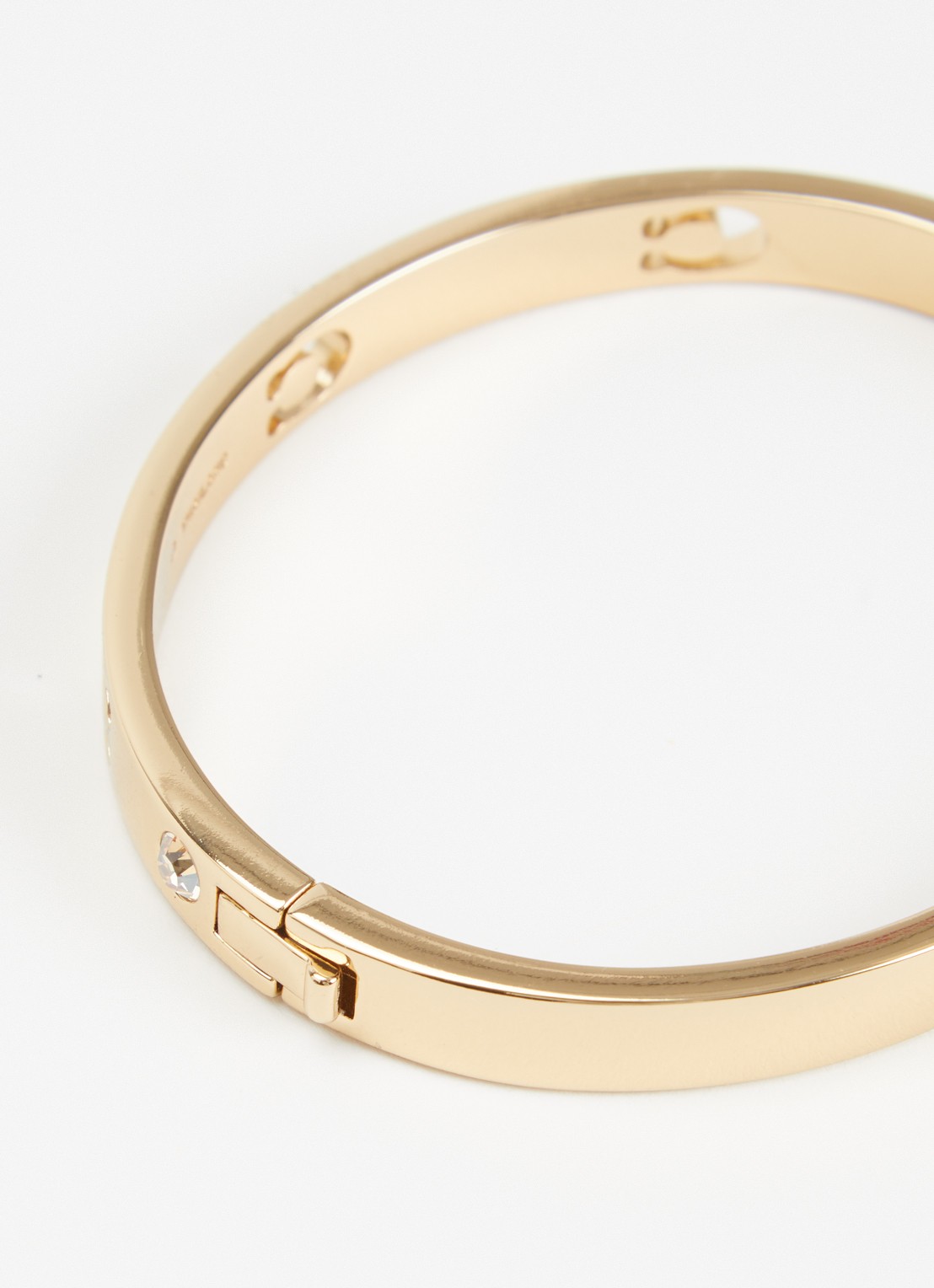 Coach Bangle met logo - detail goud