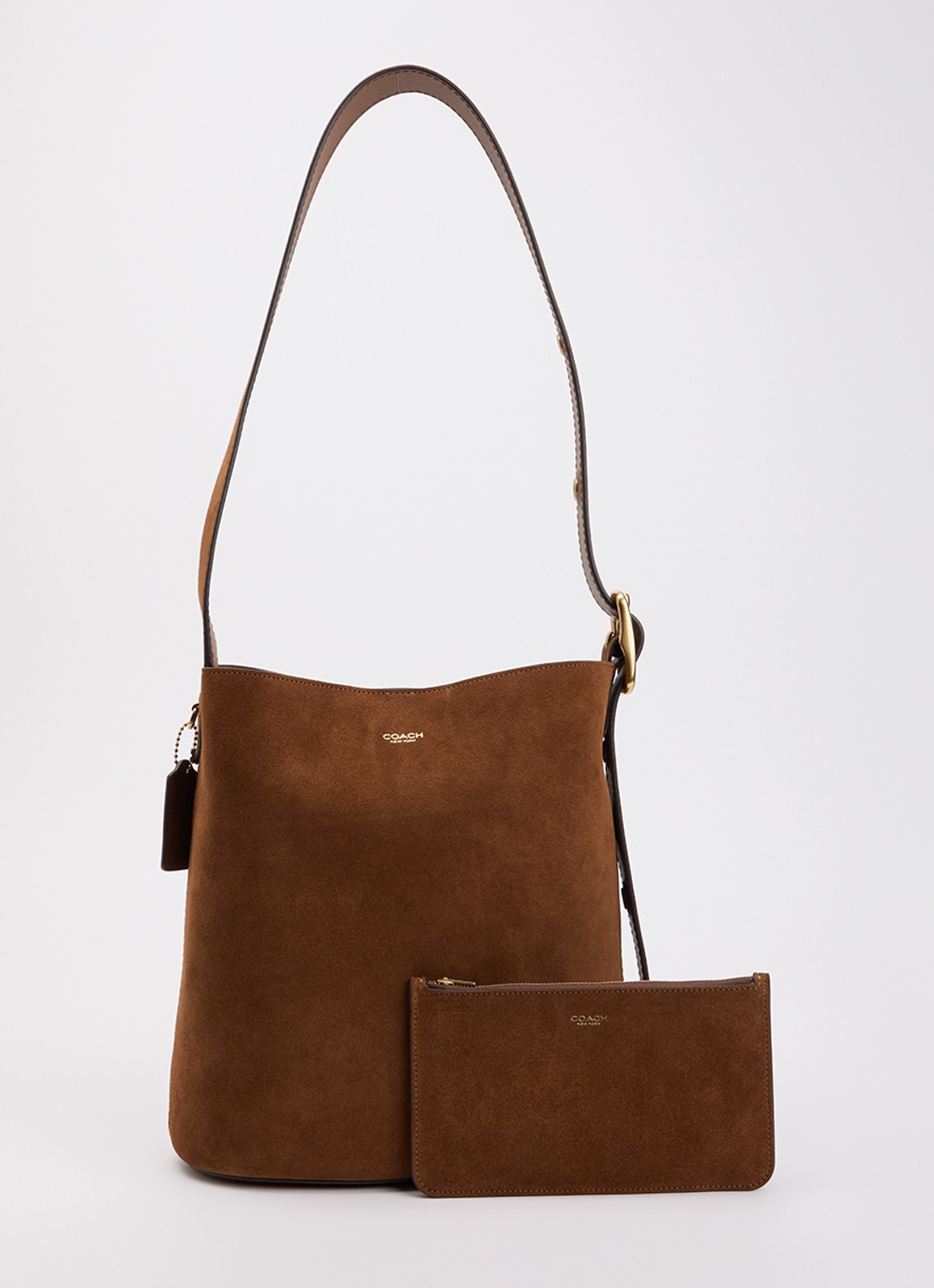Coach Bleecker Bucket schoudertas van suède met uitneembare etui - voorkant roestbruin