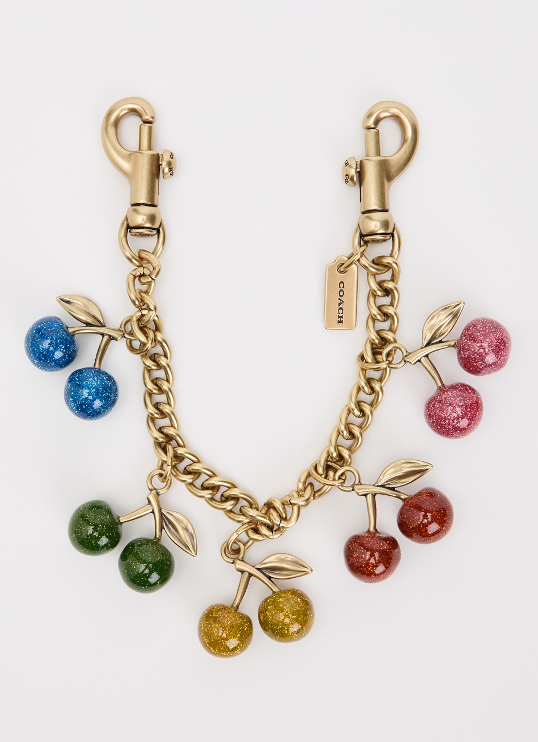 Coach Cherries tasbedel met hanger - voorkant goud