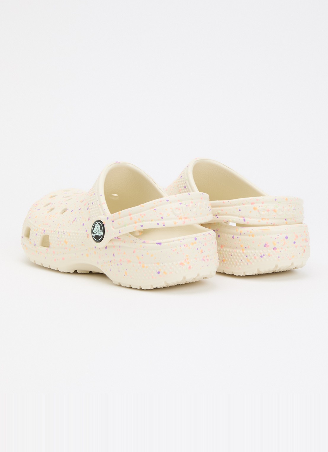 Crocs Classic Glow Paint Splatter Clog instapper met logo - achterkant ivoor