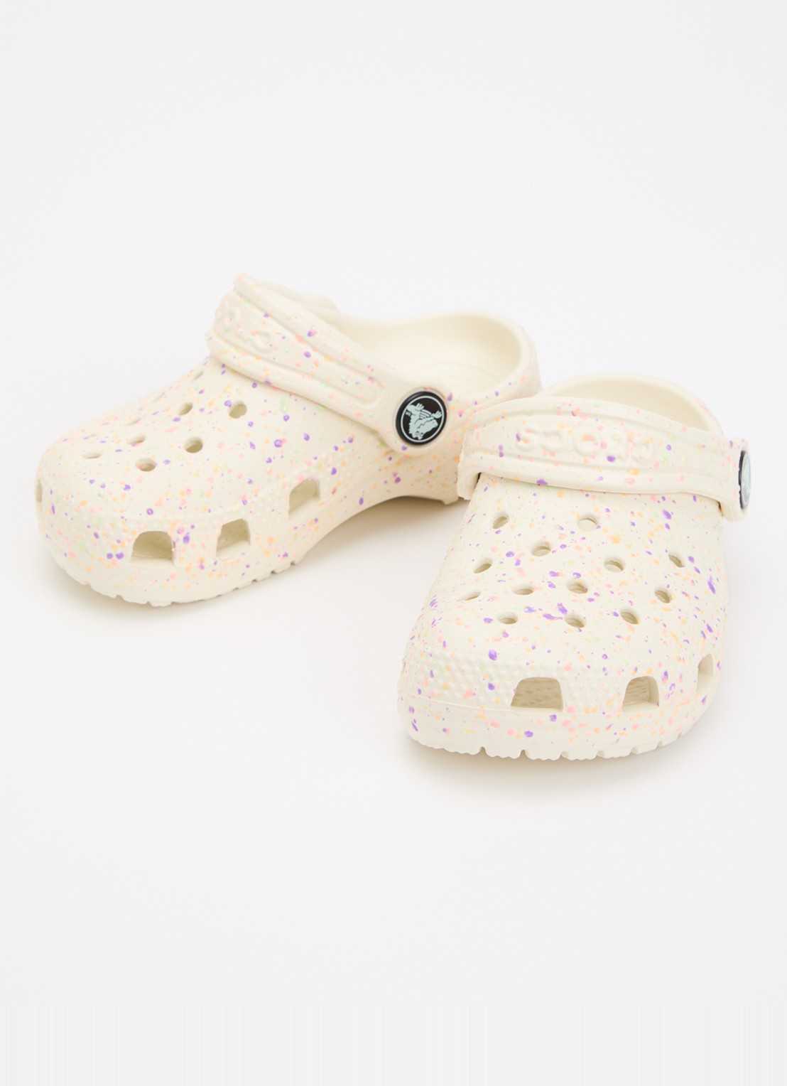 Crocs Classic Glow Paint Splatter Clog instapper met logo  - voorkant 2 beige