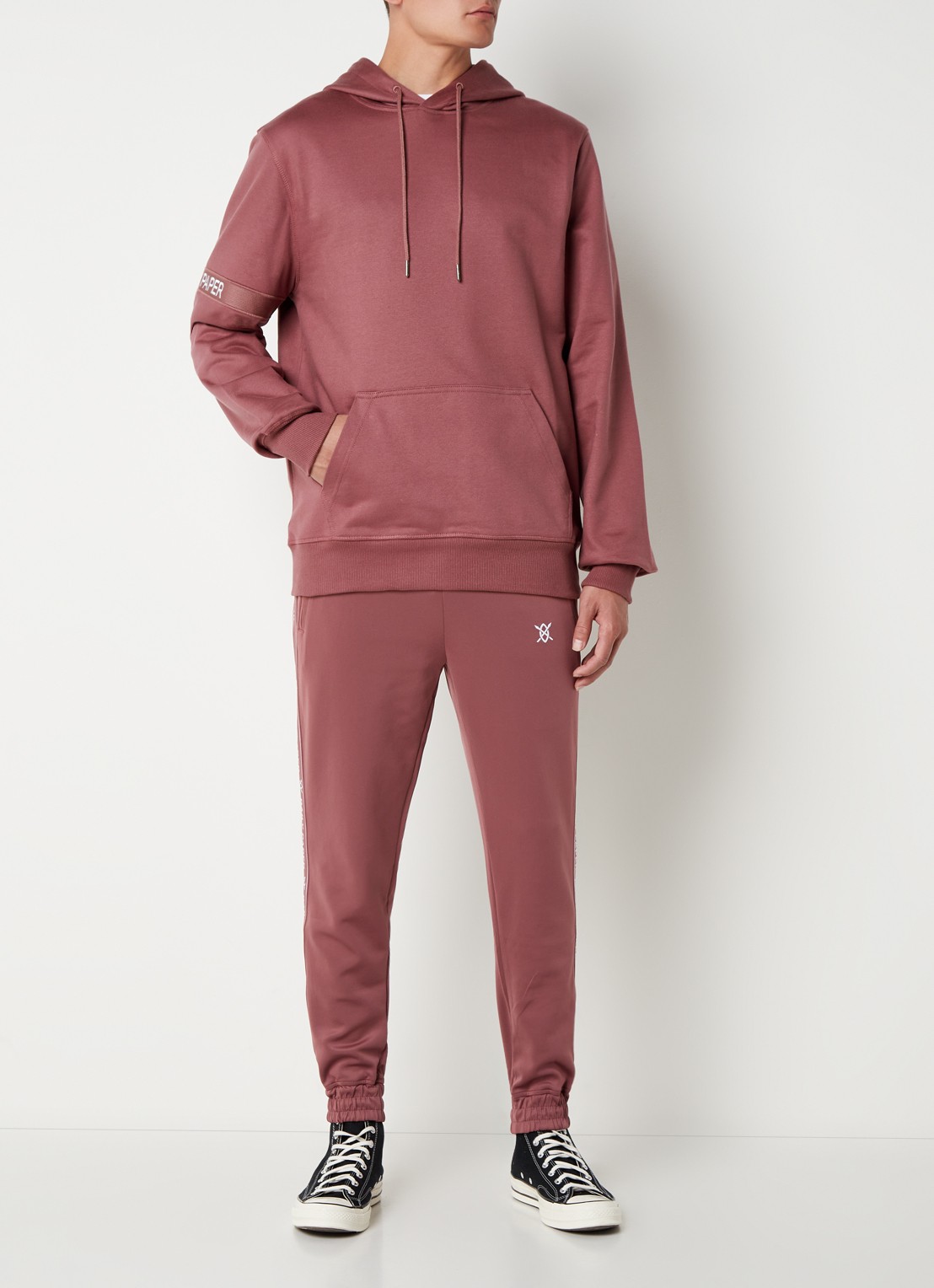 Daily Paper Etape tapered fit cropped trackpants met ritszakken en logoband - voorkant 5 roodbruin