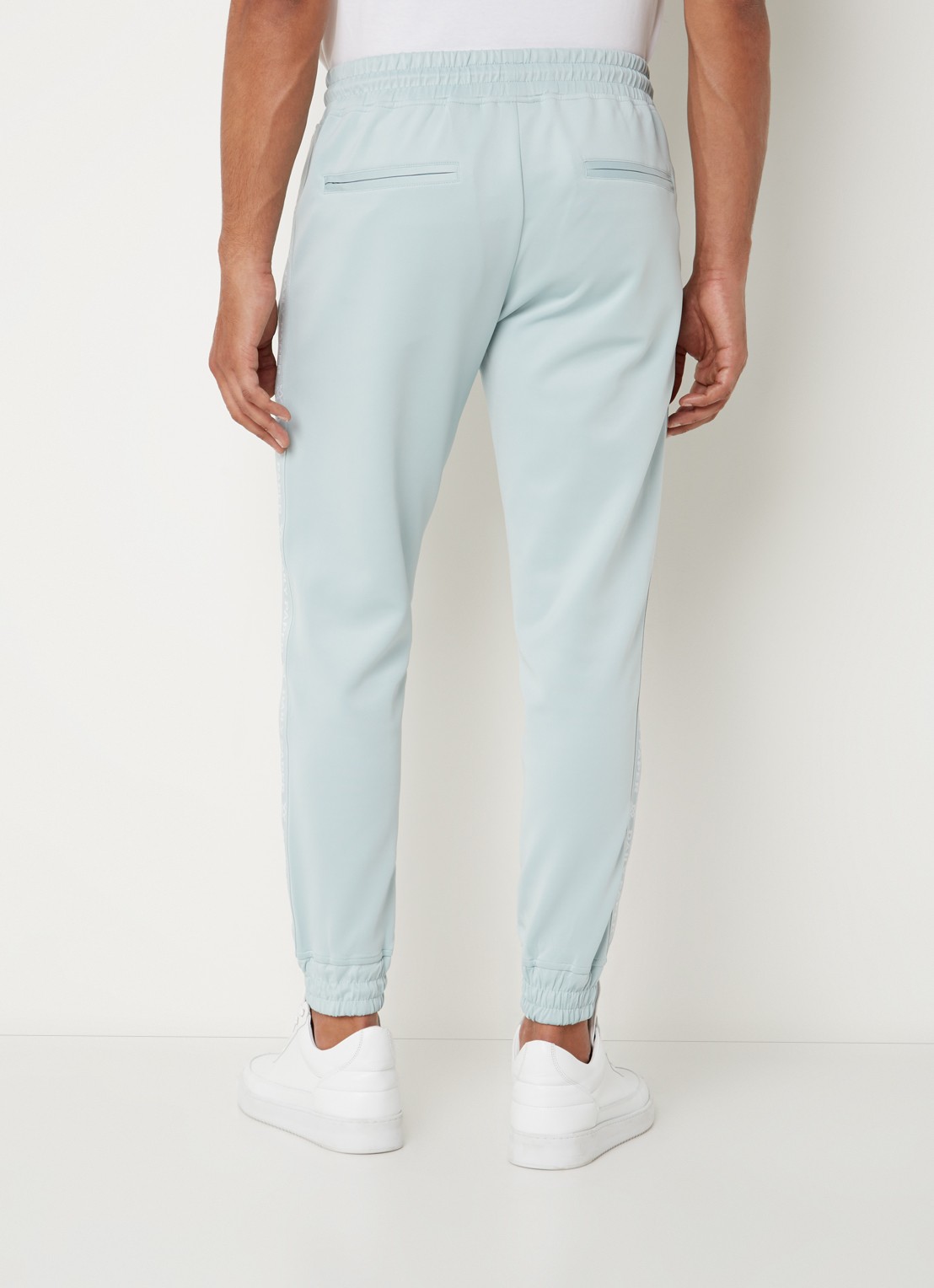 Daily Paper Etape tapered fit cropped trackpants met ritszakken en logoband - achterkant 3 mint