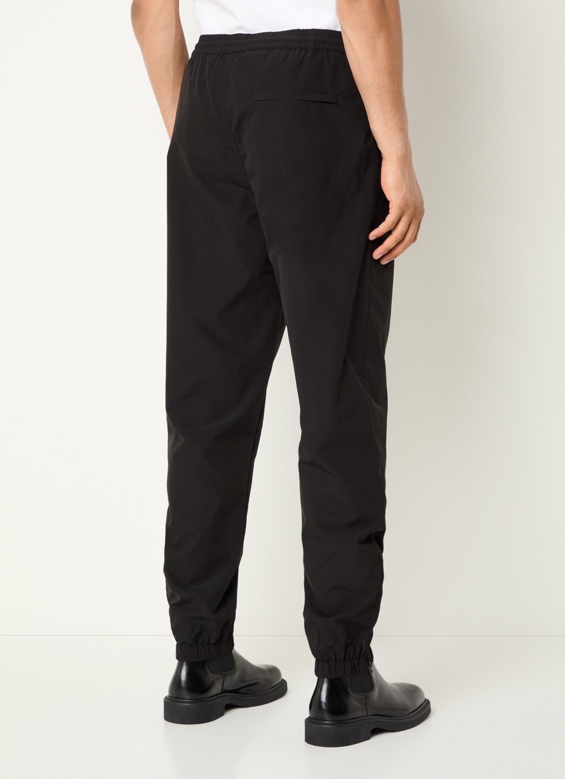 Daily Paper Eward tapered fit trackpants met logo en steekzakken - achterkant zwart