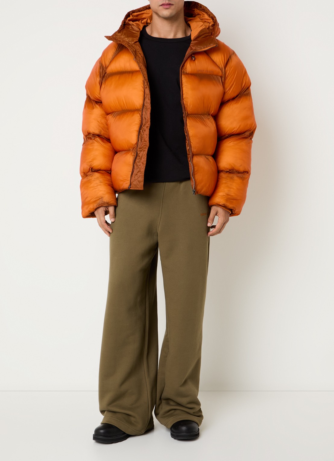 Daily Paper Raglan puffer jack met steekzakken - voorkant 2 oranje