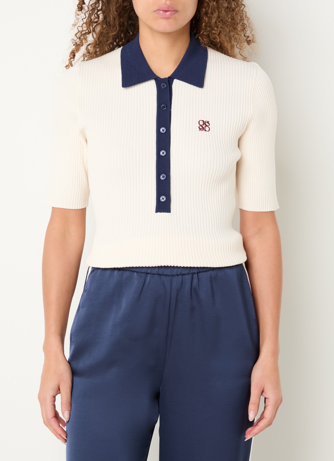 Dante 6 Byra ribgebreide polo met logoborduring - detail ivoor