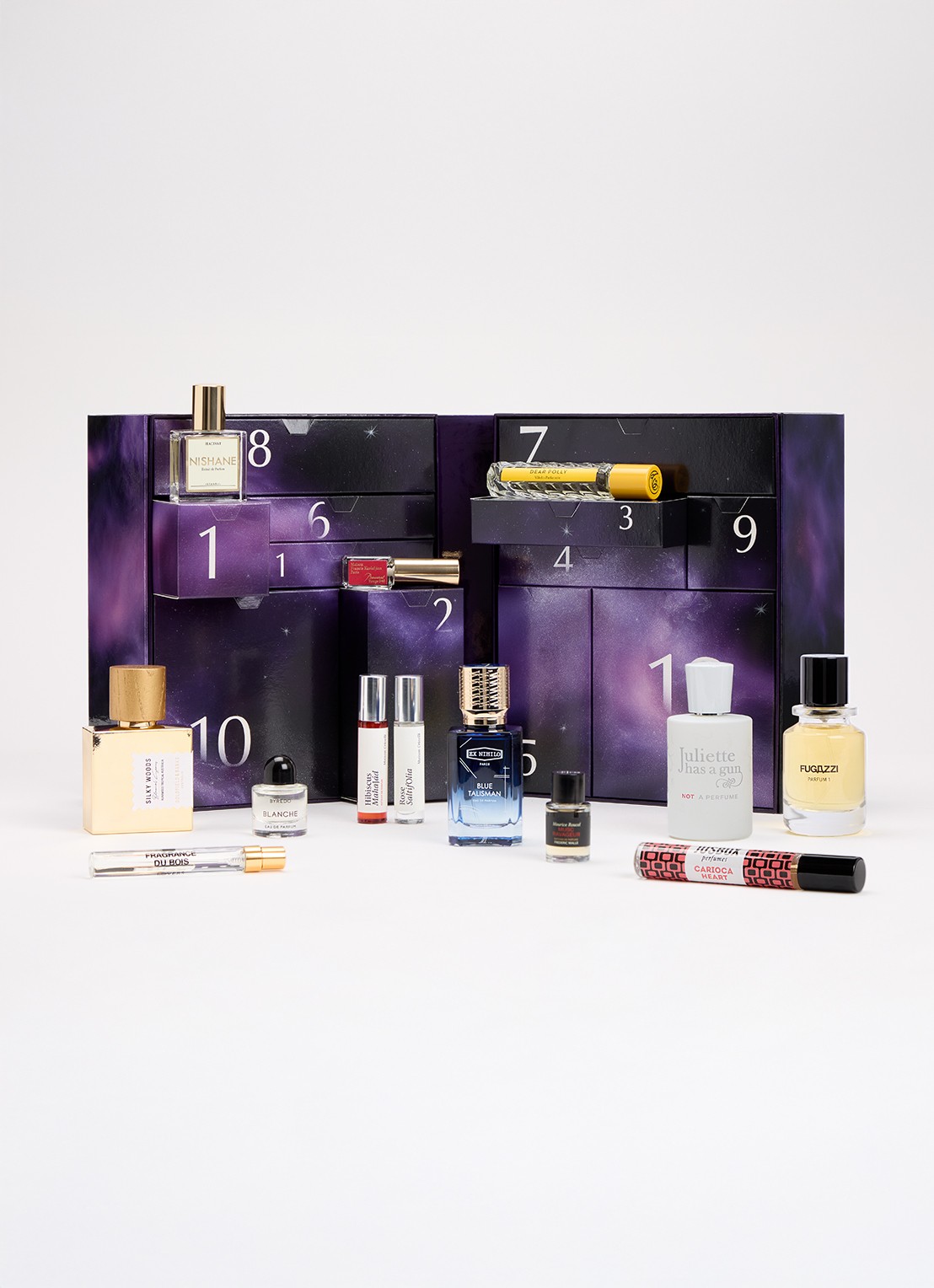 de Bijenkorf 12 dagen geuren adventskalender 2025 t.w.v €880 - voorkant paars