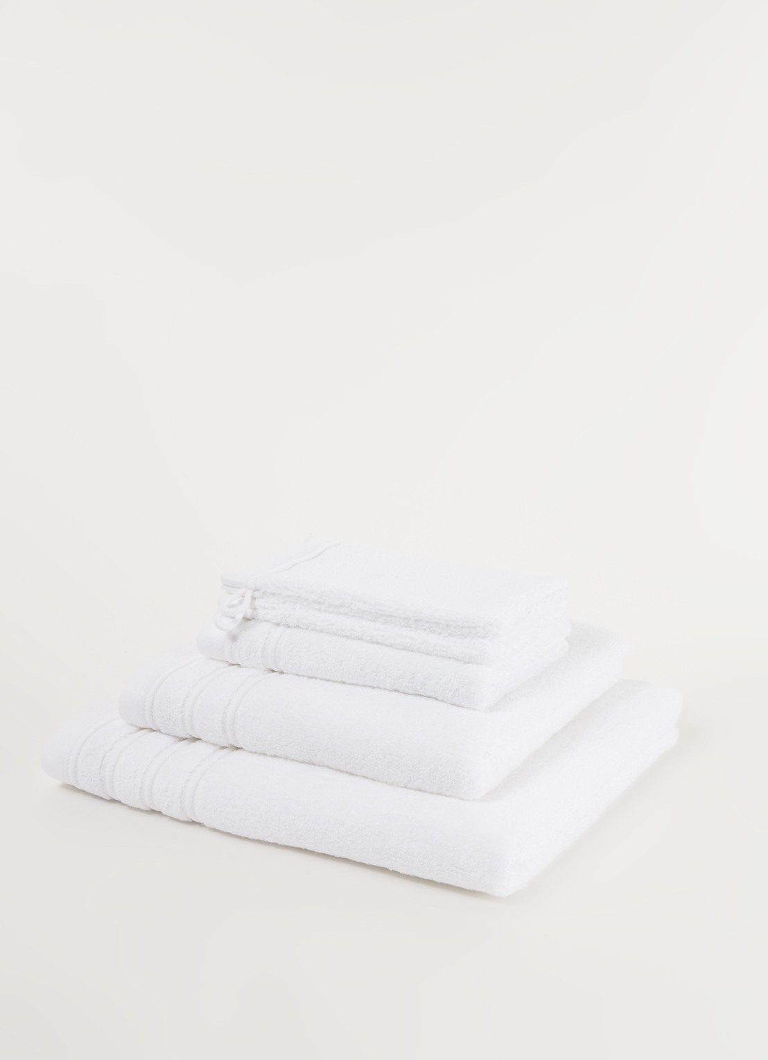 de Bijenkorf Home Evolution badhanddoek - 580 gr/m2 - 60 x 110 cm - detail wit