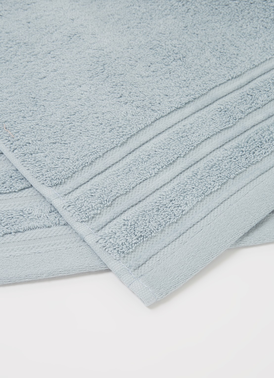de Bijenkorf Home Evolution badhanddoek - 580 gr/m2 - 60 x 110 cm - detail 4 lichtblauw