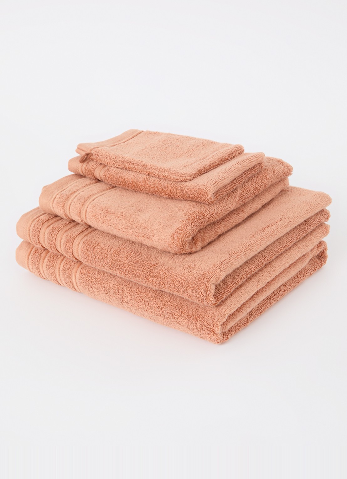 de Bijenkorf Home Evolution badlaken - 580 gr/m2 - 100 x 150 cm - voorkant 3 oranjebruin