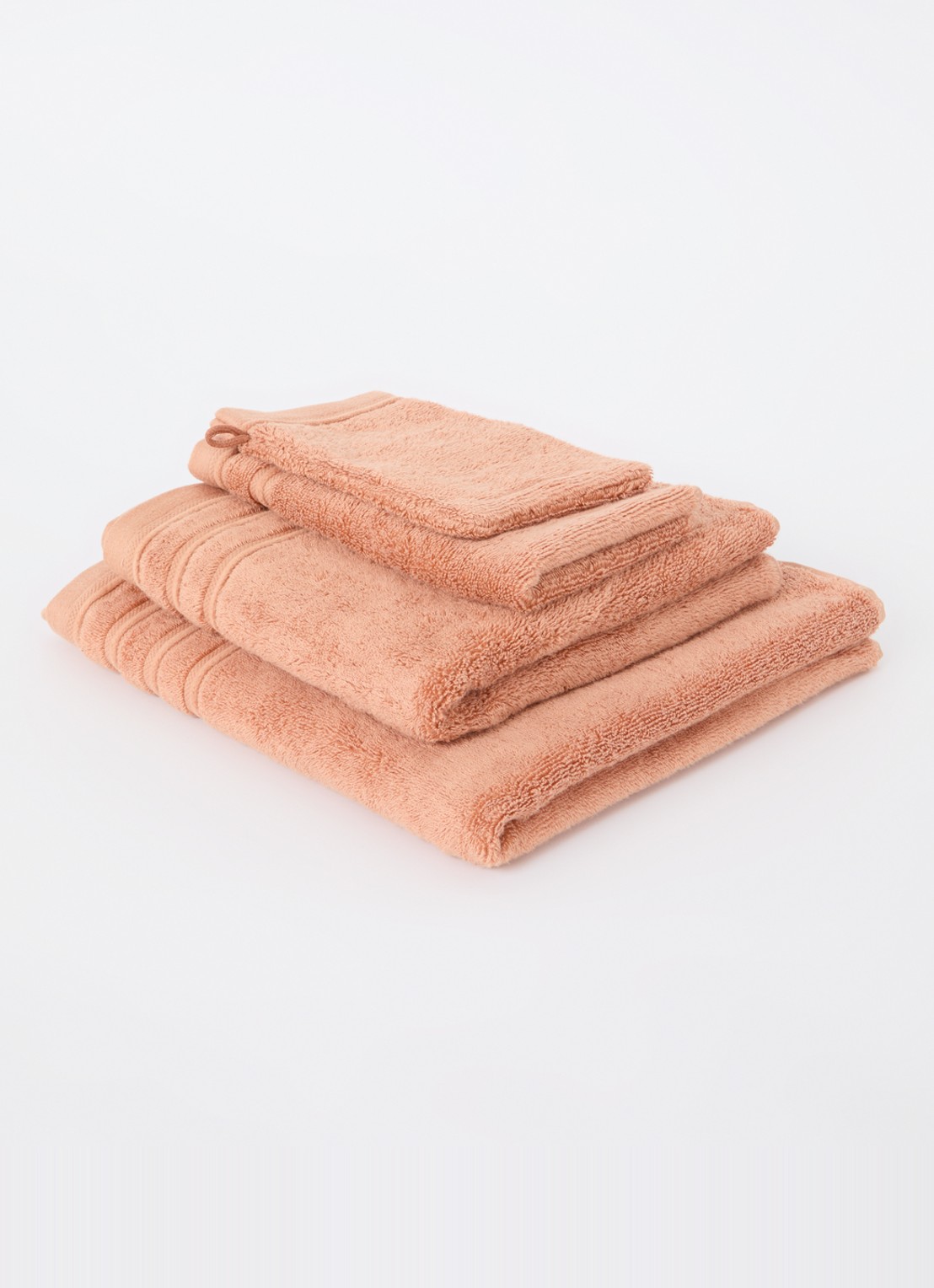 de Bijenkorf Home Evolution badlaken - 580 gr/m2 - 70 x 140 cm - voorkant 2 oranjebruin