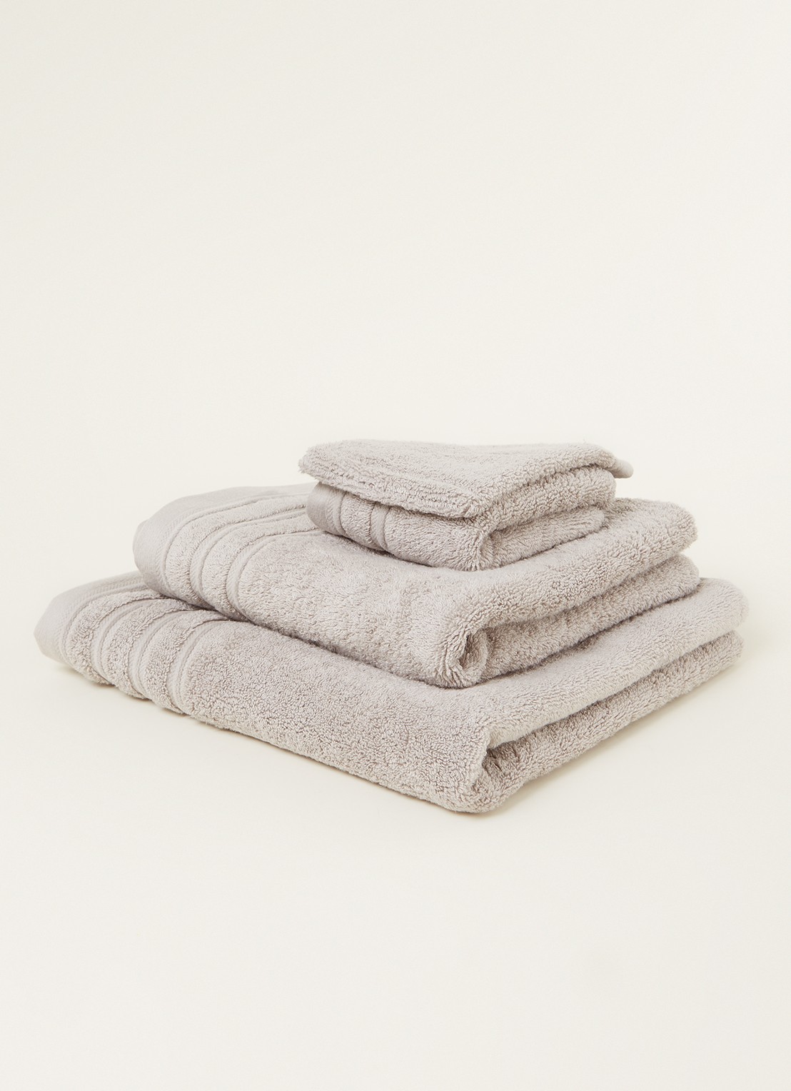 de Bijenkorf Home Evolution washand- 580 gr/m2 - 16 x 21 cm set van 2 - voorkant 2 grijs