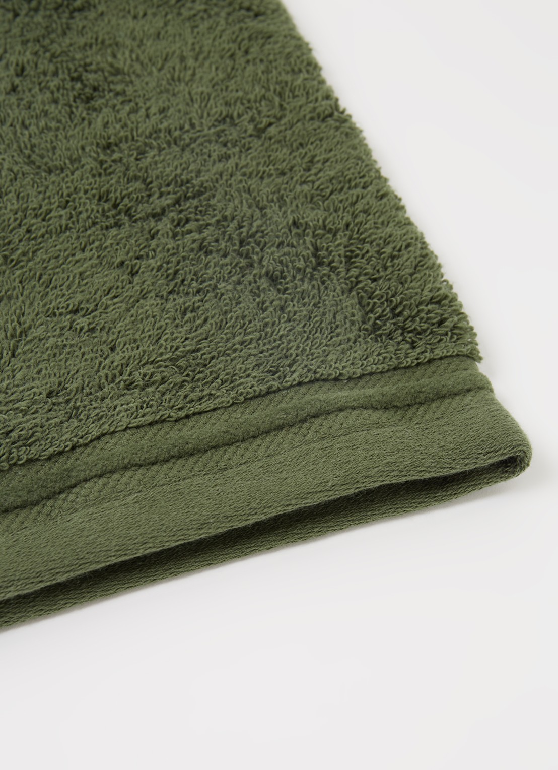 de Bijenkorf Home Evolution washand- 580 gr/m2 - 16 x 21 cm set van 2 - detail donkergroen